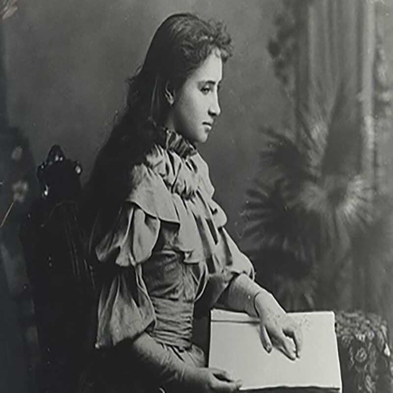 Helen Keller using Braille